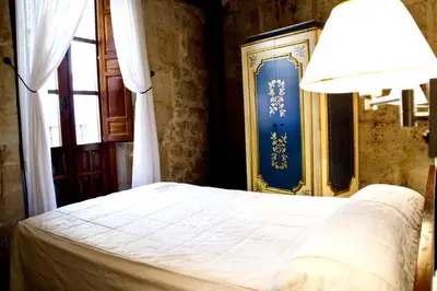 Cama o camas de una habitación en Hotel Microtel Placentinos