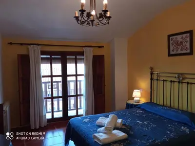 Cama o camas de una habitación en El Humilladero