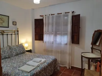 Cama o camas de una habitación en El Humilladero