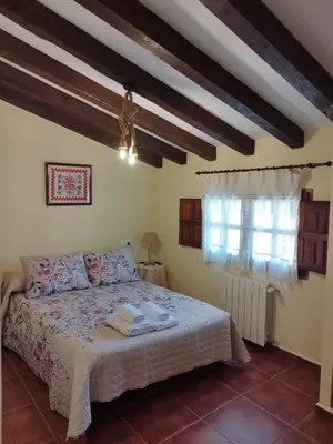 Cama o camas de una habitación en El Humilladero