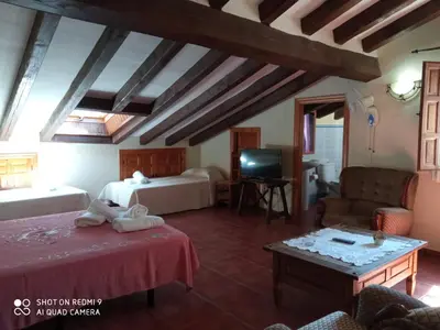 Cama o camas de una habitación en El Humilladero