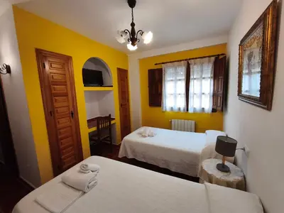 Cama o camas de una habitación en El Humilladero
