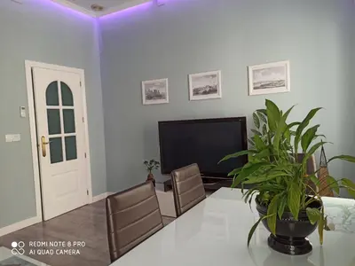 Una televisión o centro de entretenimiento en La Casa de la Alcazaba - Free Parking