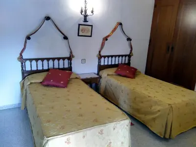 Cama o camas de una habitación en Hostal Meson la Cadena