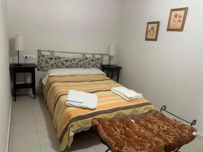 Cama o camas de una habitación en Vivienda de uso turístico La Vega de Vita