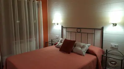 Cama o camas de una habitación en El Cordel de Gredos