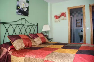 Cama o camas de una habitación en Hostal Zaguan