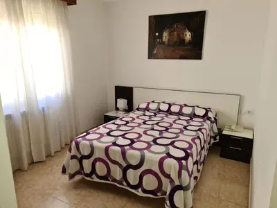 Cama o camas de una habitación en Hostal San Blas