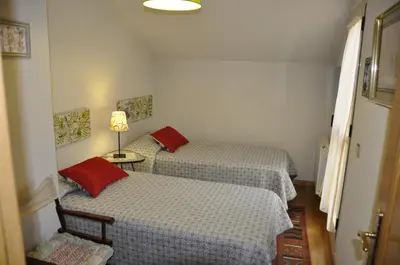 Cama o camas de una habitación en Alameda del Tormes