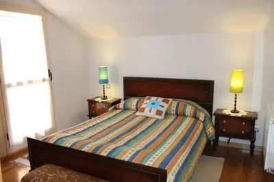 Cama o camas de una habitación en Alameda del Tormes