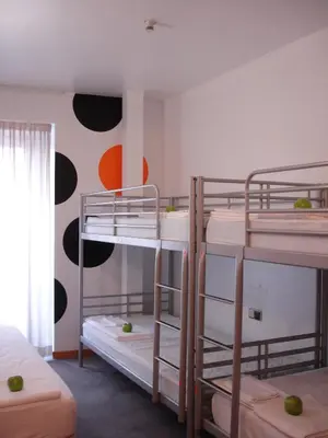Cama o camas de una habitación en Albergue Revolutum Hostel