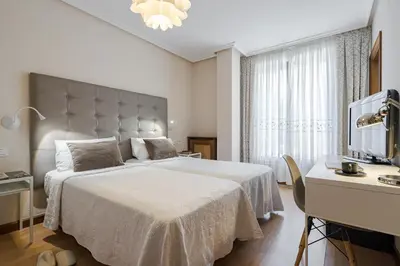 Cama o camas de una habitación en Hotel Salamanca Rio