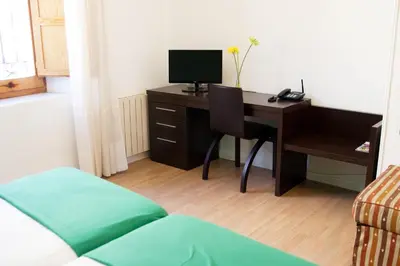 Una televisión o centro de entretenimiento en Gran Hostal San Segundo