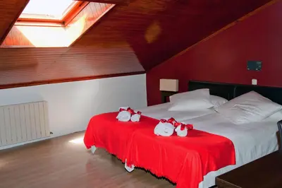 Cama o camas de una habitación en Gran Hostal San Segundo