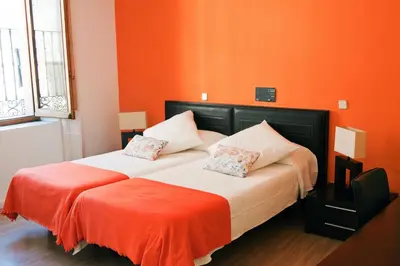 Cama o camas de una habitación en Gran Hostal San Segundo