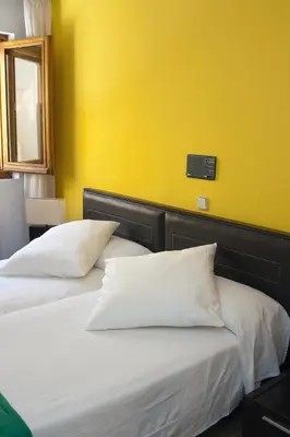 Cama o camas de una habitación en Gran Hostal San Segundo
