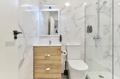 Un baño de Hostal Carmen by gaiarooms