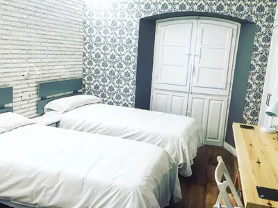Cama o camas de una habitación en Le Vintage
