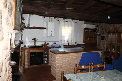 Una cocina o zona de cocina en Casa Rural La Pastera