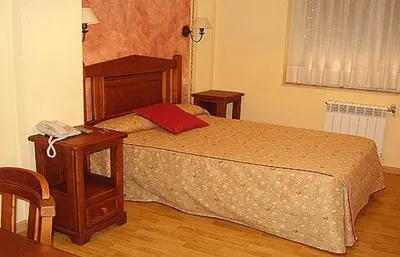Cama o camas de una habitación en La Becera