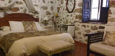 Cama o camas de una habitación en Hospederia Doña Ligia