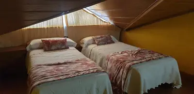 Cama o camas de una habitación en Hospederia Doña Ligia