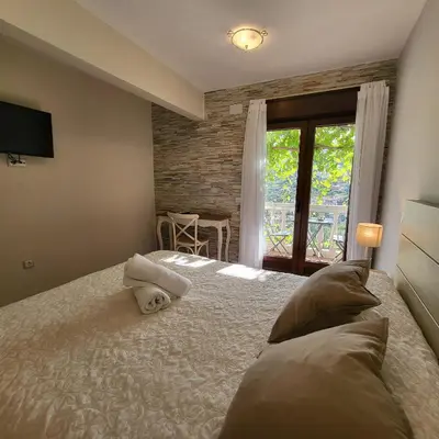 Cama o camas de una habitación en Hostal El Cerro - Only Adults