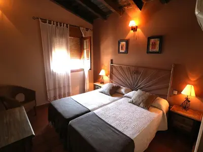 Cama o camas de una habitación en Posadas De Granadilla