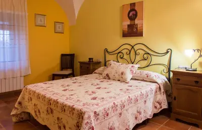 Cama o camas de una habitación en Casa Rural El Fuentarro