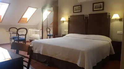 Cama o camas de una habitación en Hotel Iberia Plaza América