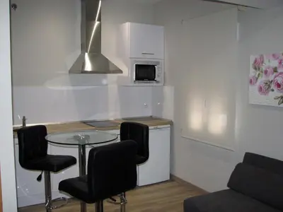 Una cocina o zona de cocina en Apartamentos Mitreo