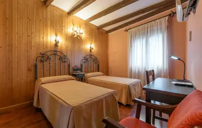 Cama o camas de una habitación en Hotel Rural Los Angeles en Las Hurdes