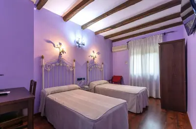 Cama o camas de una habitación en Hotel Rural Los Angeles en Las Hurdes