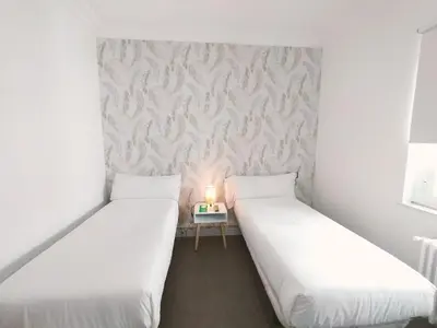 Cama o camas de una habitación en Hostal Gonzala by gaiarooms