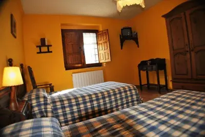 Cama o camas de una habitación en La Trocha De Hoyorredondo