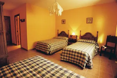 Cama o camas de una habitación en La Trocha De Hoyorredondo