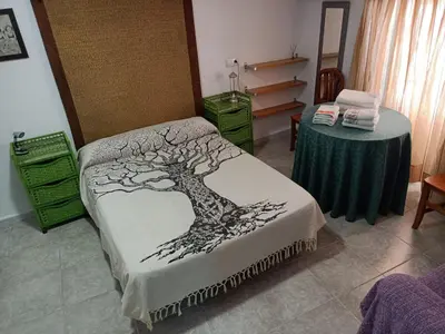 Cama o camas de una habitación en Apartamento Turístico MURALLA DE CÁCERES AT-CC-00601