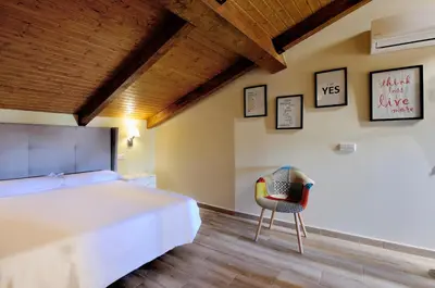 Cama o camas de una habitación en Plaza Sandra