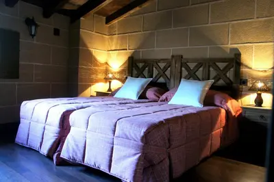 Cama o camas de una habitación en Casa Rural Estrela