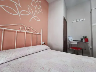 Cama o camas de una habitación en Hostal Senero