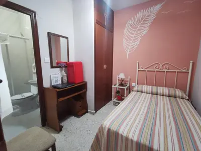 Cama o camas de una habitación en Hostal Senero
