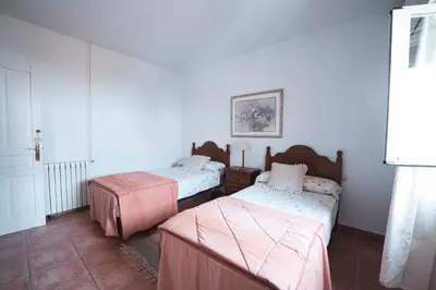 Cama o camas de una habitación en Casa Rural Dehesa de Solana