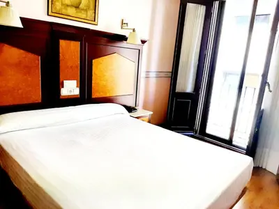 Cama o camas de una habitación en Hosteria Sara by gaiarooms
