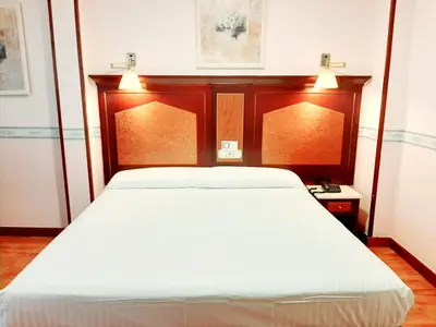 Cama o camas de una habitación en Hosteria Sara by gaiarooms