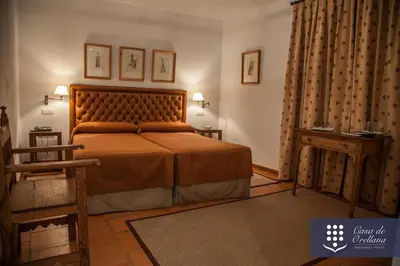Cama o camas de una habitación en Hotel Boutique Casa de Orellana