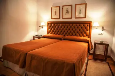 Cama o camas de una habitación en Hotel Boutique Casa de Orellana