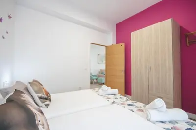 Cama o camas de una habitación en Apartamentos Coso de San Albin