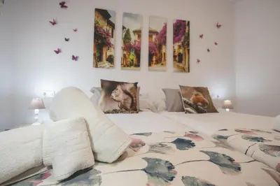 Cama o camas de una habitación en Apartamentos Coso de San Albin