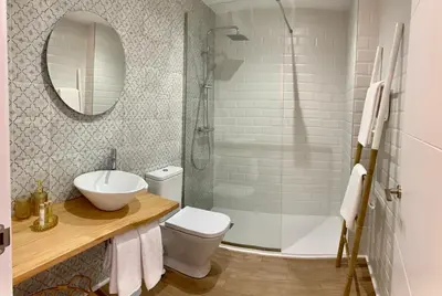 Un baño de Apartamentos Succo