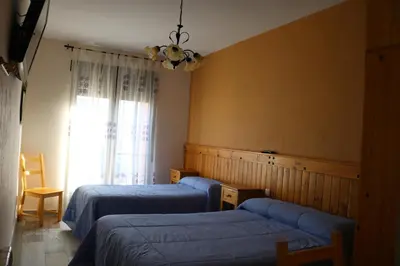 Cama o camas de una habitación en Casa Rural 